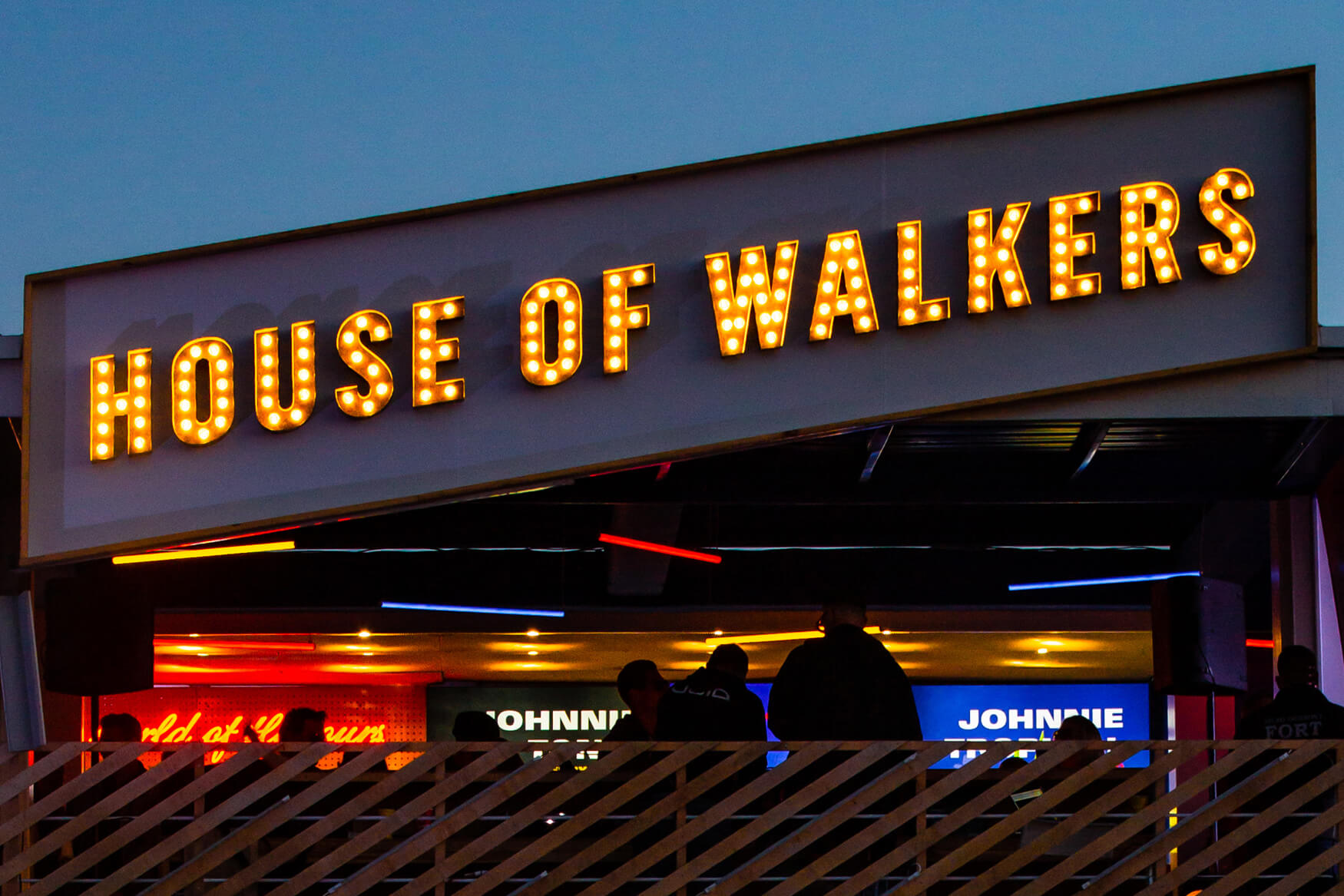 House of Walkers - sheet metal letters filled with light bulbs above the entrance